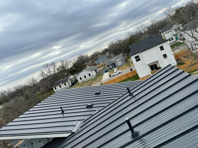 Standing seam metal roof panels with vents for Skylight Repair in Ogdensburg